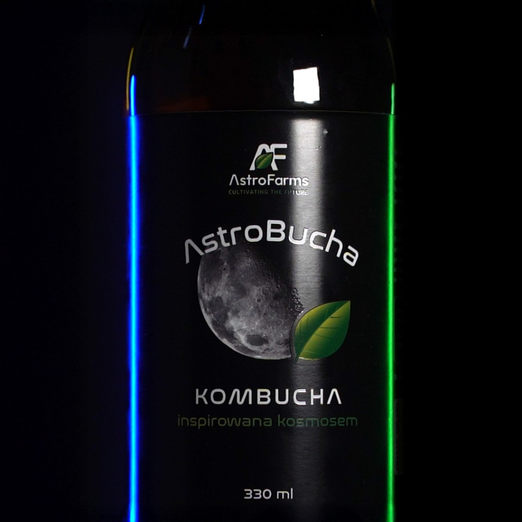 Close-up of the AstroBucha label on a black background